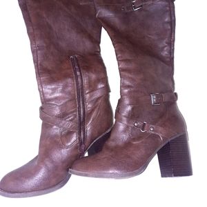 Knee high heeled boots